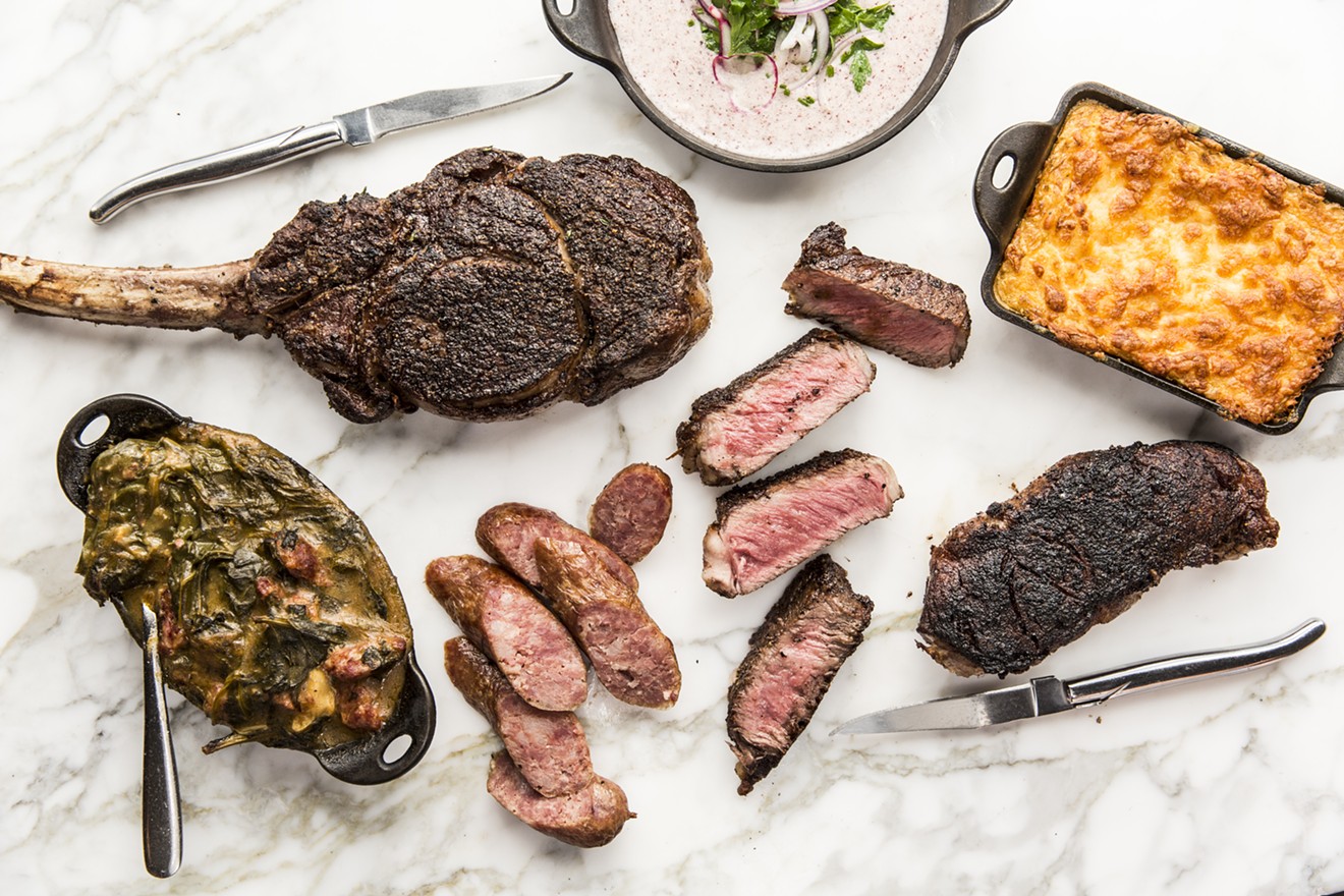 One Fifth Steak by Chris Shepherd debuts this month. Clockwise from top: Jimmy Red Corn porridge, Grit Spoonbread, Cast Iron-Seared New York Strip, Sliced Cast Iron Ribeye, Bacon Sausage, Bacon Sausage Creamed Collard Greens, Bone-In Ribeye.