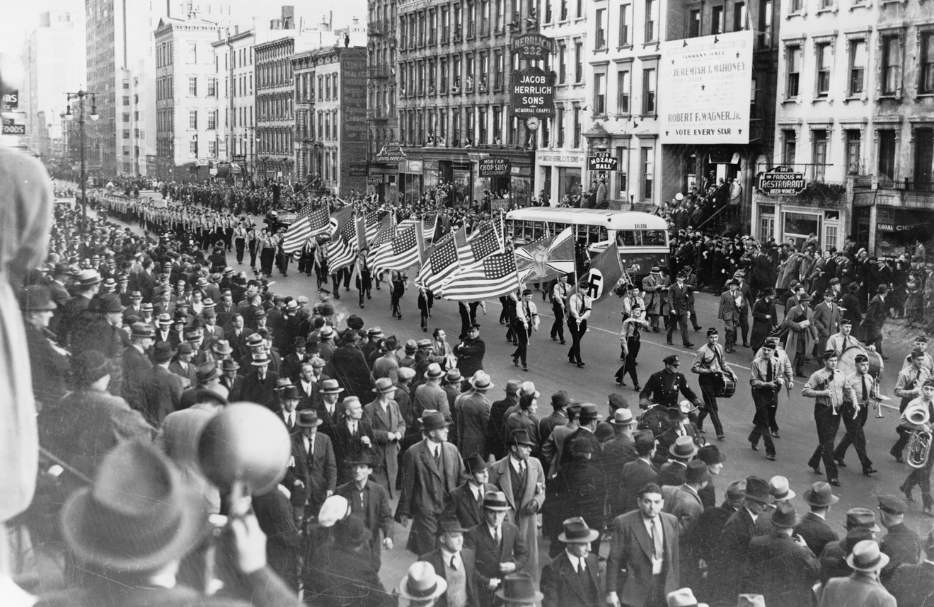 The German American Bund held parades in which U.S. and Nazi flags were marched side  by side, like in this one from October 30, 1939 on the streets of New York City.