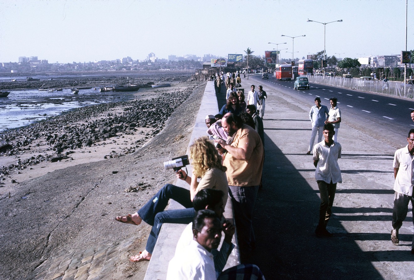 Peter Grant (standing) with Led Zeppelin, Marine Drive, Mumbai, India, 1972.