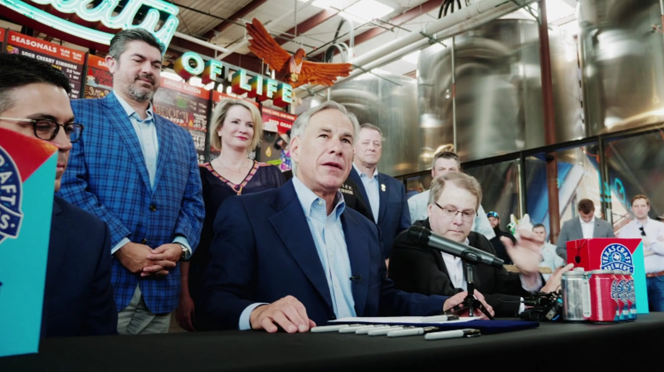 A tweet from Gov. Greg Abbott (shown here at the 2019 beer-to-go bill signing) hinted that state bars might reopen soon.