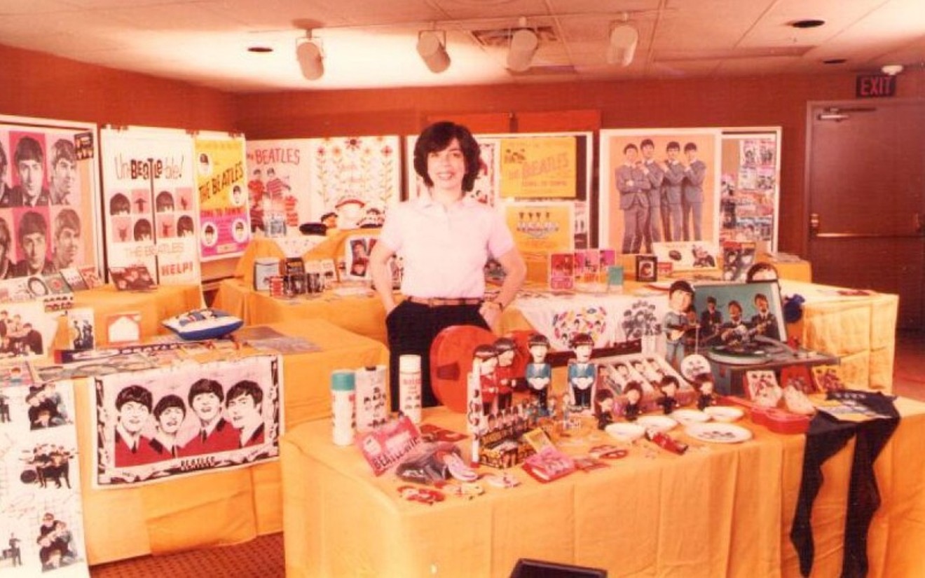 Debbie Gendler shows off her personal collection of Beatles memorabilia during the 1983 Beatlefest convention at the Bonaventure Hotel in Los Angeles.