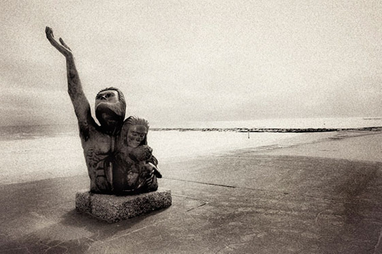 Storm of 1900 statue on the Galveston Seawall after Hurricane Ike hit in 2008.