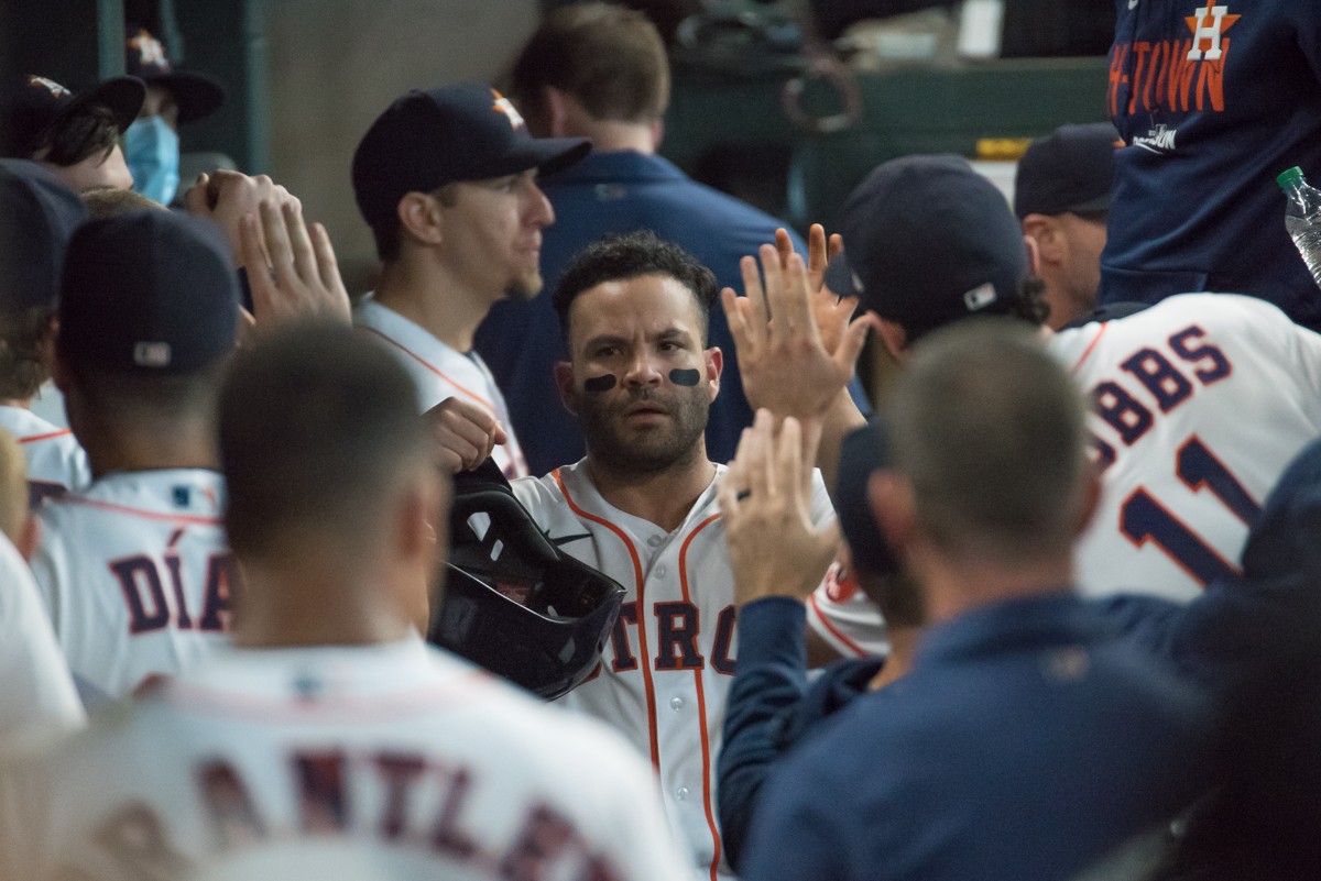 Jose Altuve capped off a huge offensive outing by the Astros with a three-run homer in the ninth.