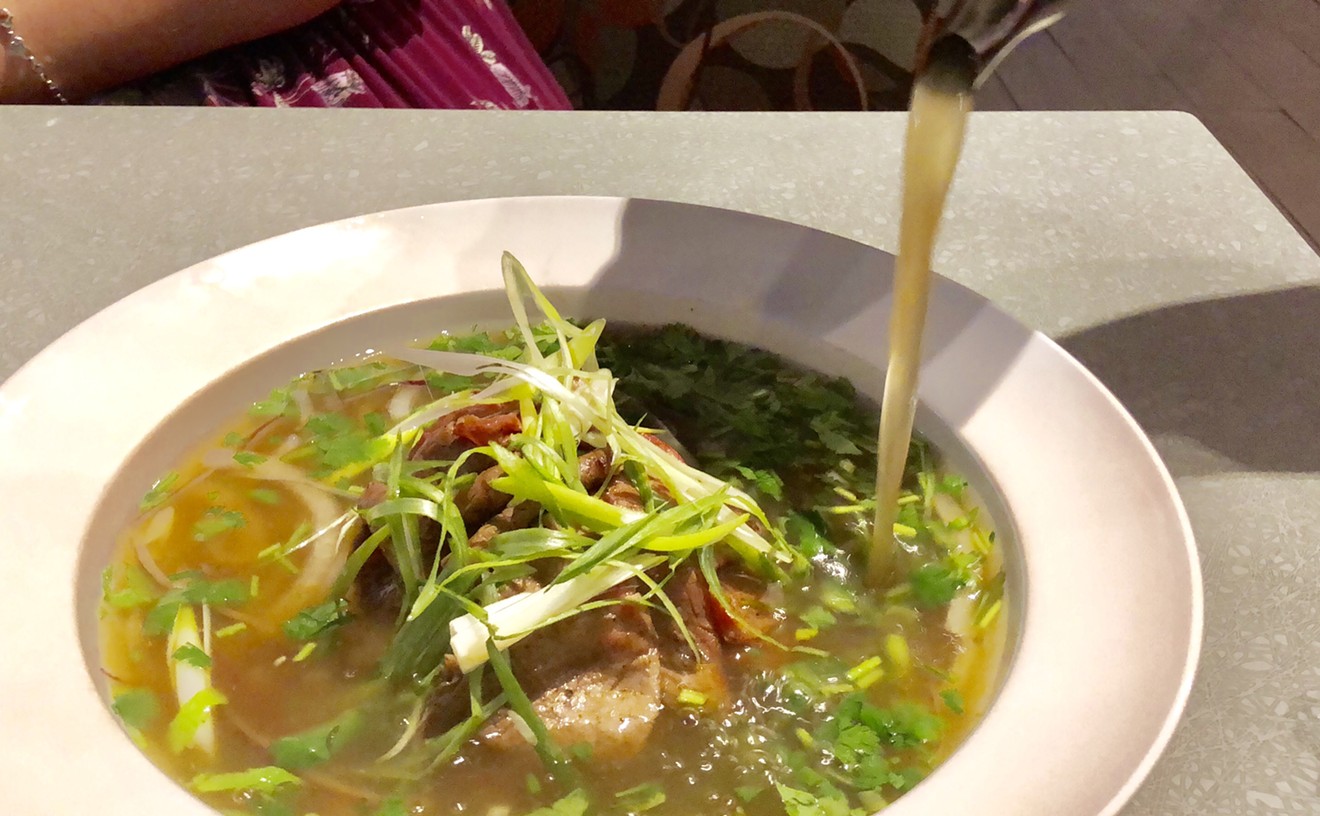 Oxtail pho is topped with thinly sliced Wagyu beef at Saigon House, taking a family recipe and making it even better.