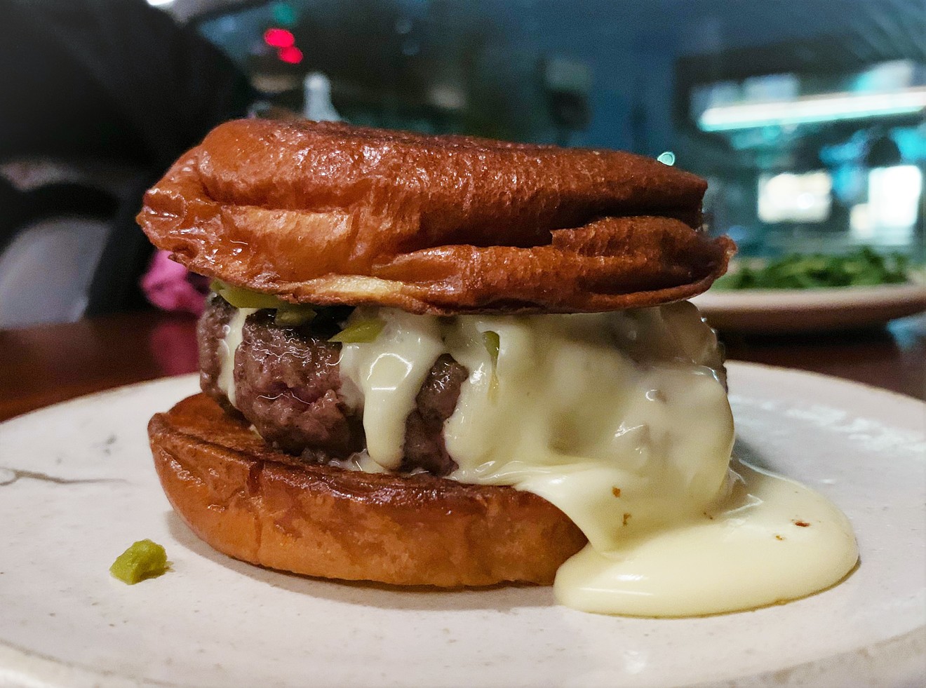 Oozing with butter and raclette cheese, Squable's French cheeseburger is a stunner.