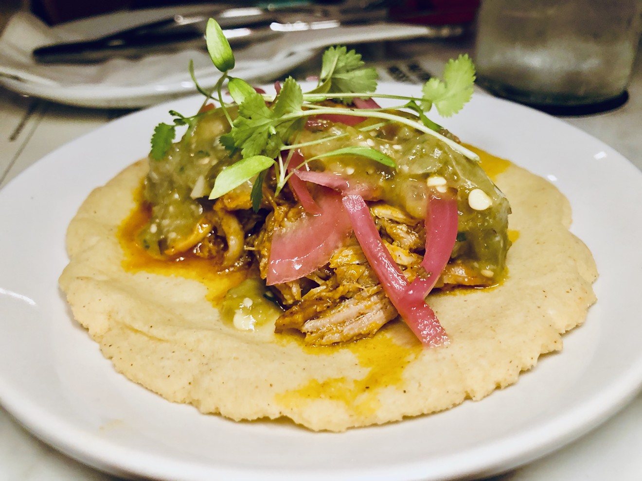 The cochinita pibil taco is the signature taco at Cochinita & Co.