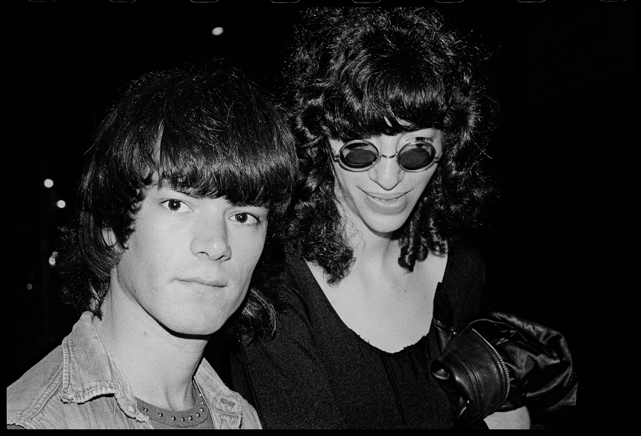 Dee Dee Ramone and Joey Ramone backstage at a punk rock show.