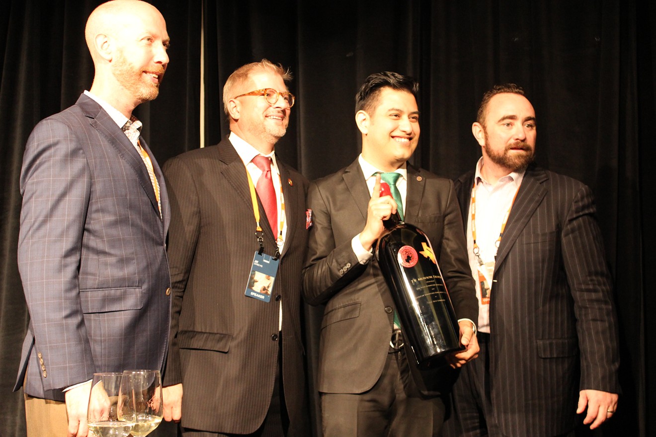 Andres Blanco, second from right, winner of this year's Texsom Best Sommelier competition, with Master Sommeliers (from left) James Tidwell, Jay James, and Drew Hendricks, who proctor the event's examinations.