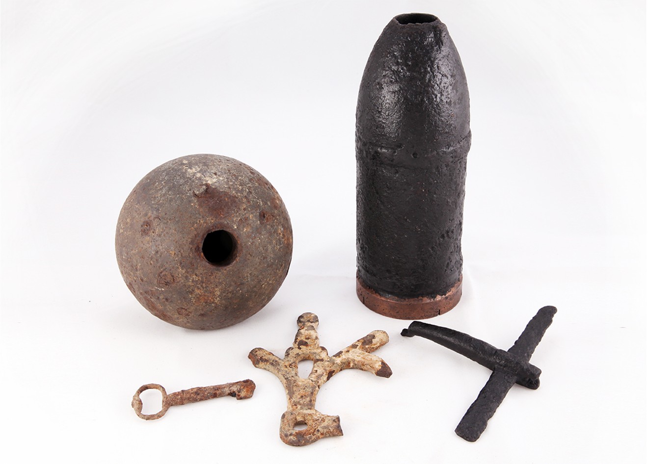 A new exhibit at The Heritage Society, "Dumped and Forgotten Below the Milam Street Bridge," explores Houston's role in the Civil War through munitions, artifacts and history.