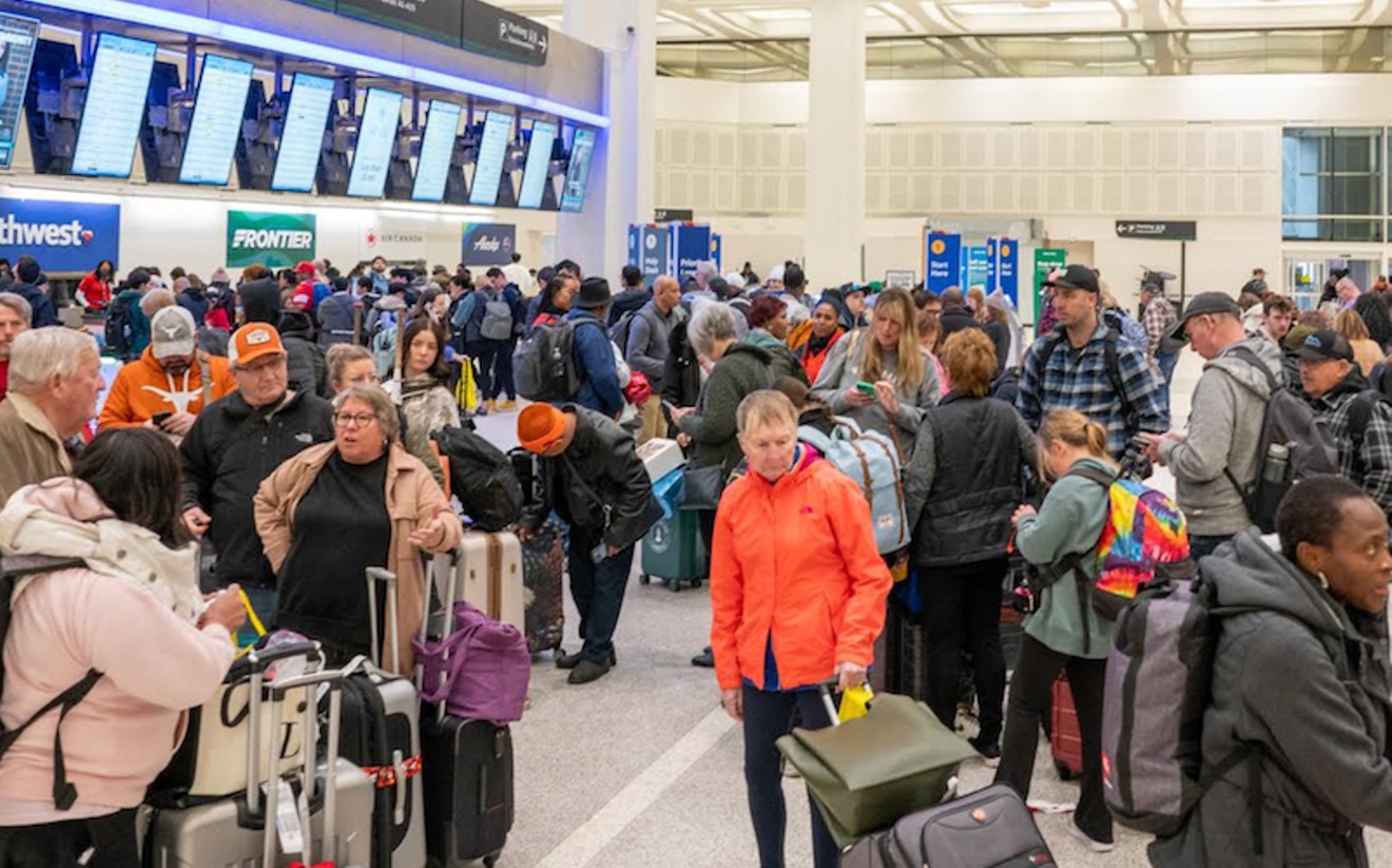 Travelers piled into George Bush Intercontinental Airport's Terminal A Ticketing area on Monday, trying to figure out whether their flight was one that was canceled or delayed.