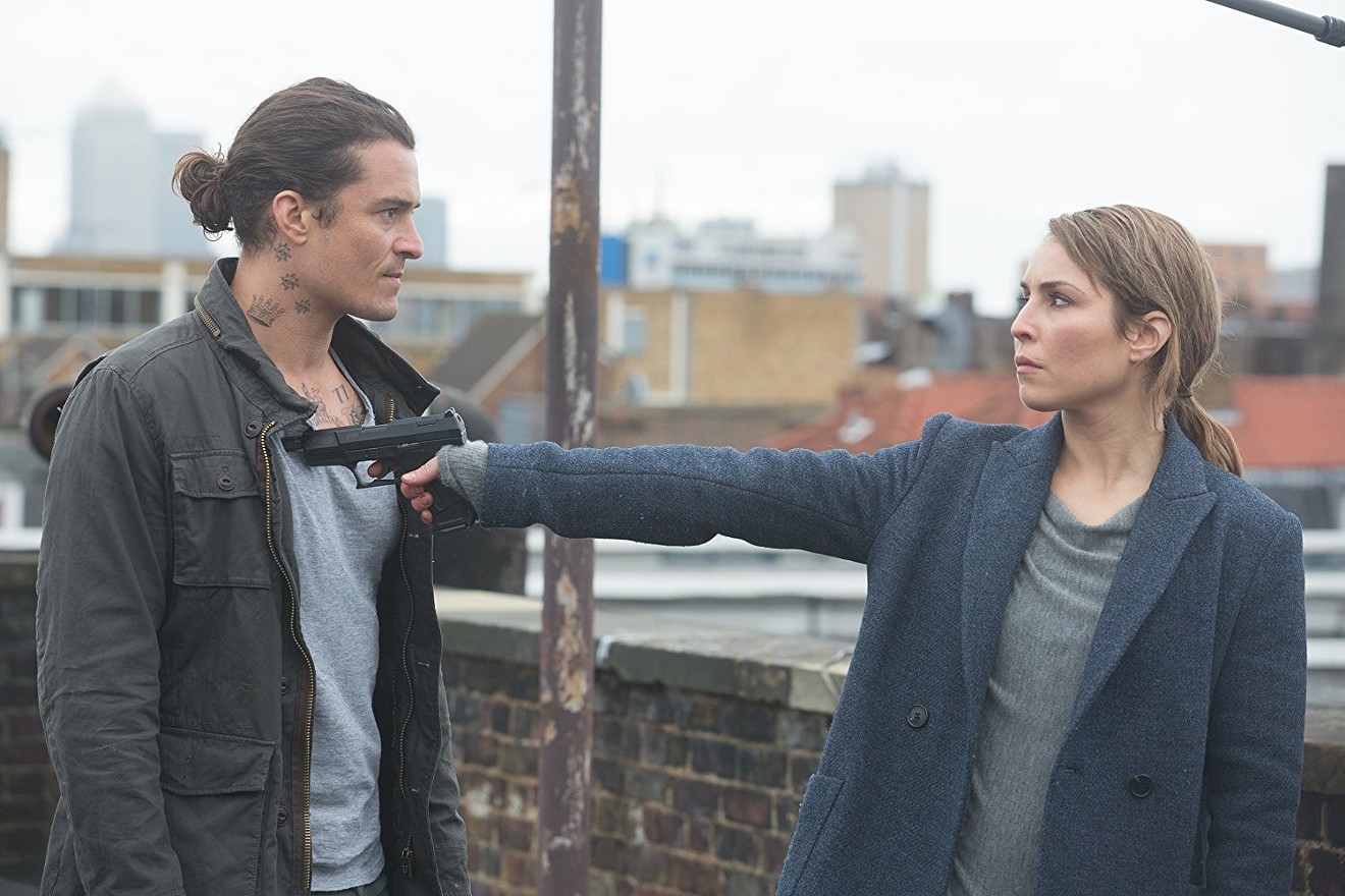 As Alice Racine, a CIA agent who defends London from a massive terrorist attack in Unlocked, Noomi Rapace (right) faces off with Orlando Bloom.