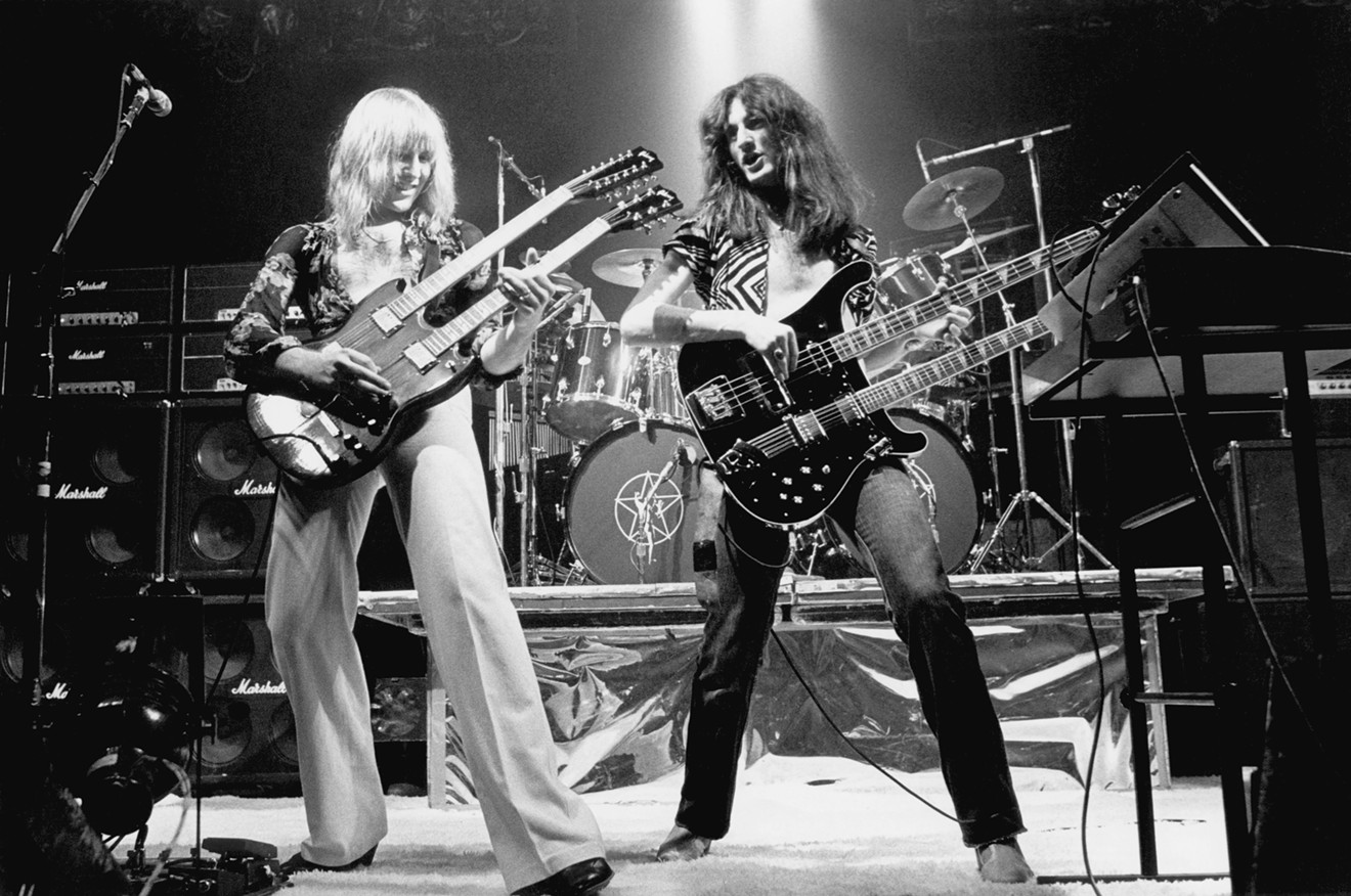 The mighty Canadians Rush (Alex Lifeson, Geddy Lee and Neal Peart, hidden) at the peak of their hirsute '70s days, one of Prog's best-known acts.