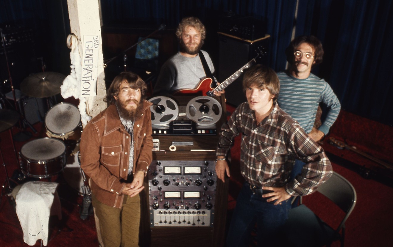 CCR during the cover photo shoot for "Cosmo's Factory": Doug Clifford (whose nickname was "Cosmo"), Tom Fogerty, John Fogerty, Stu Cook.