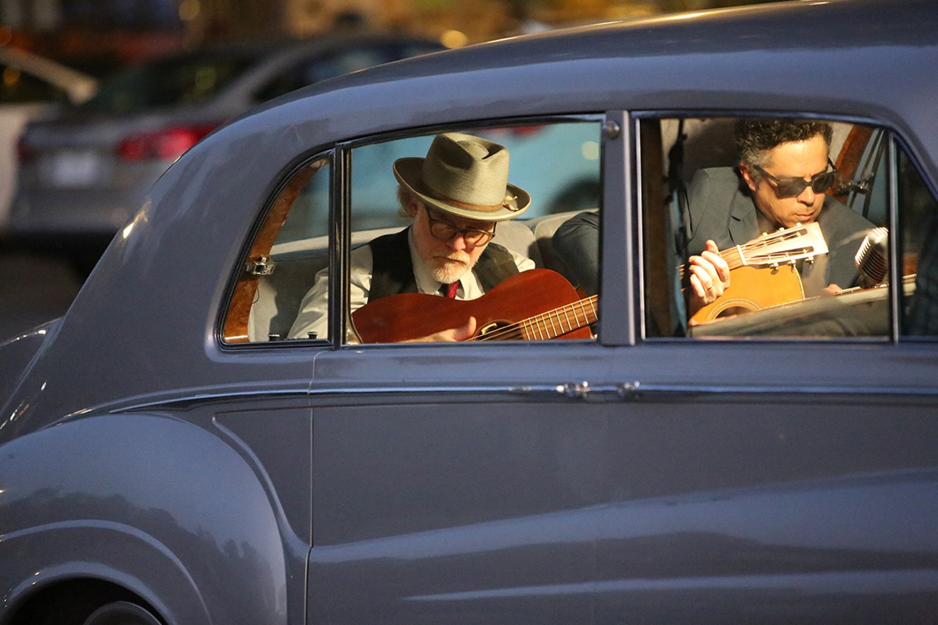 Elvis Presley's 1963 Rolls-Royce takes cinema-goers on a star-studded musical road trip from Memphis to New York and Las Vegas in Eugene Jarecki's The King, now playing at Alamo Drafthouse Cinema. Shown: Mike Coykendall and M. Ward