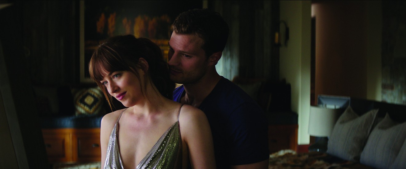 Dakota Johnson (left) and Jamie Dornan are back as young lovers Anastasia Steele and and Christian Grey, respectively, in Fifty Shades Freed, the final installment in E.L. James’s trilogy of novels.
