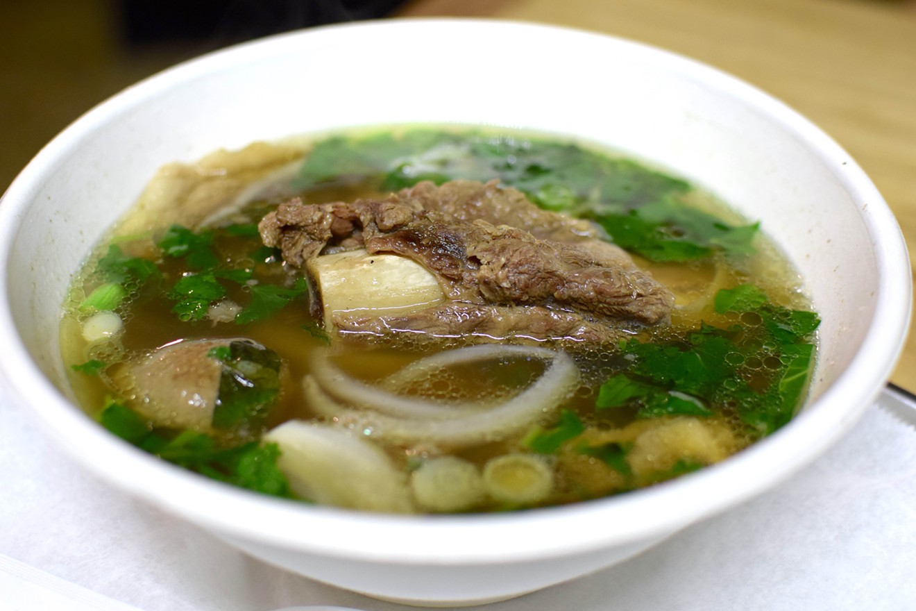 My bowl of build-your-own pho at The Pho spot featured meatballs, flank steak, a giant beef rib and more.