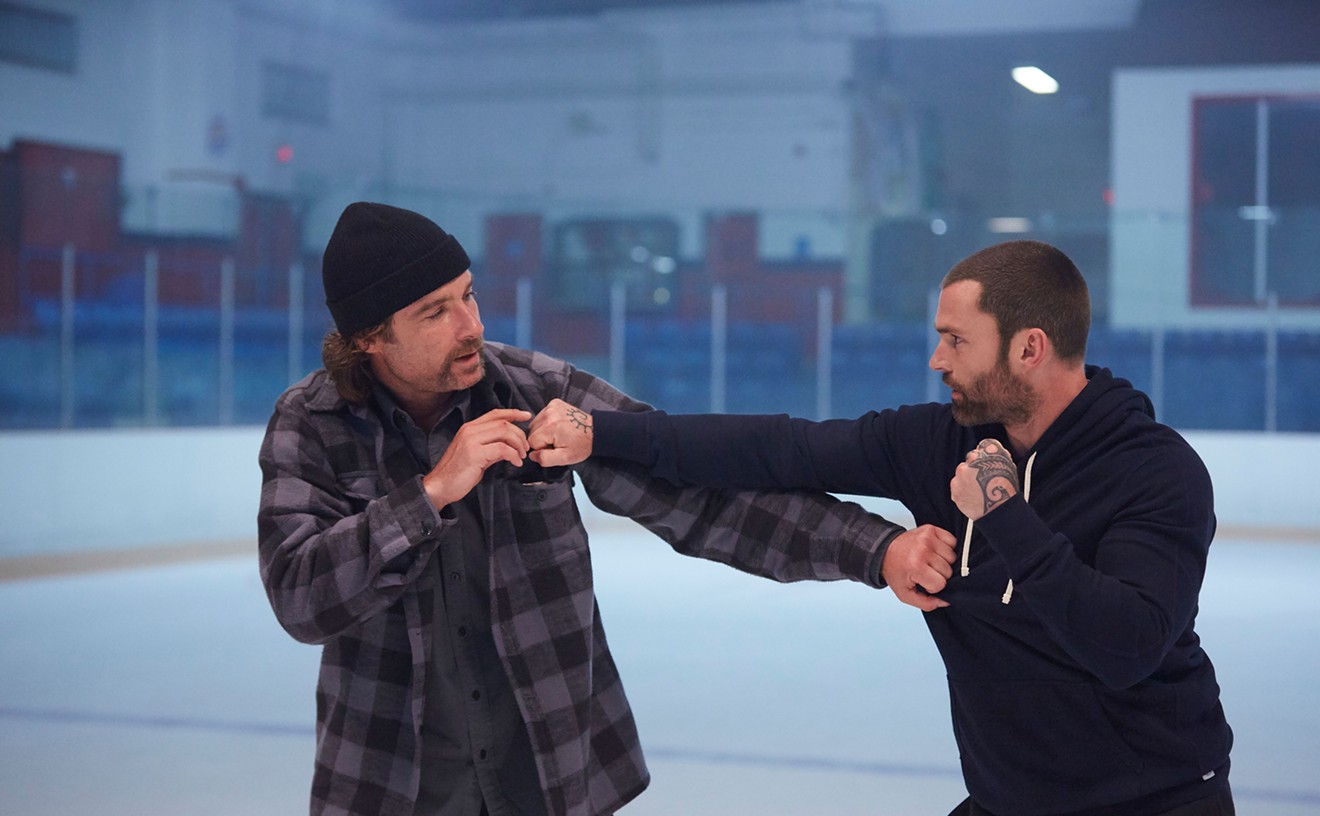 Liev Schreiber (left) and Seann William Scott square off as fighting-mad hockey players in Goon: Last of the Enforcers.