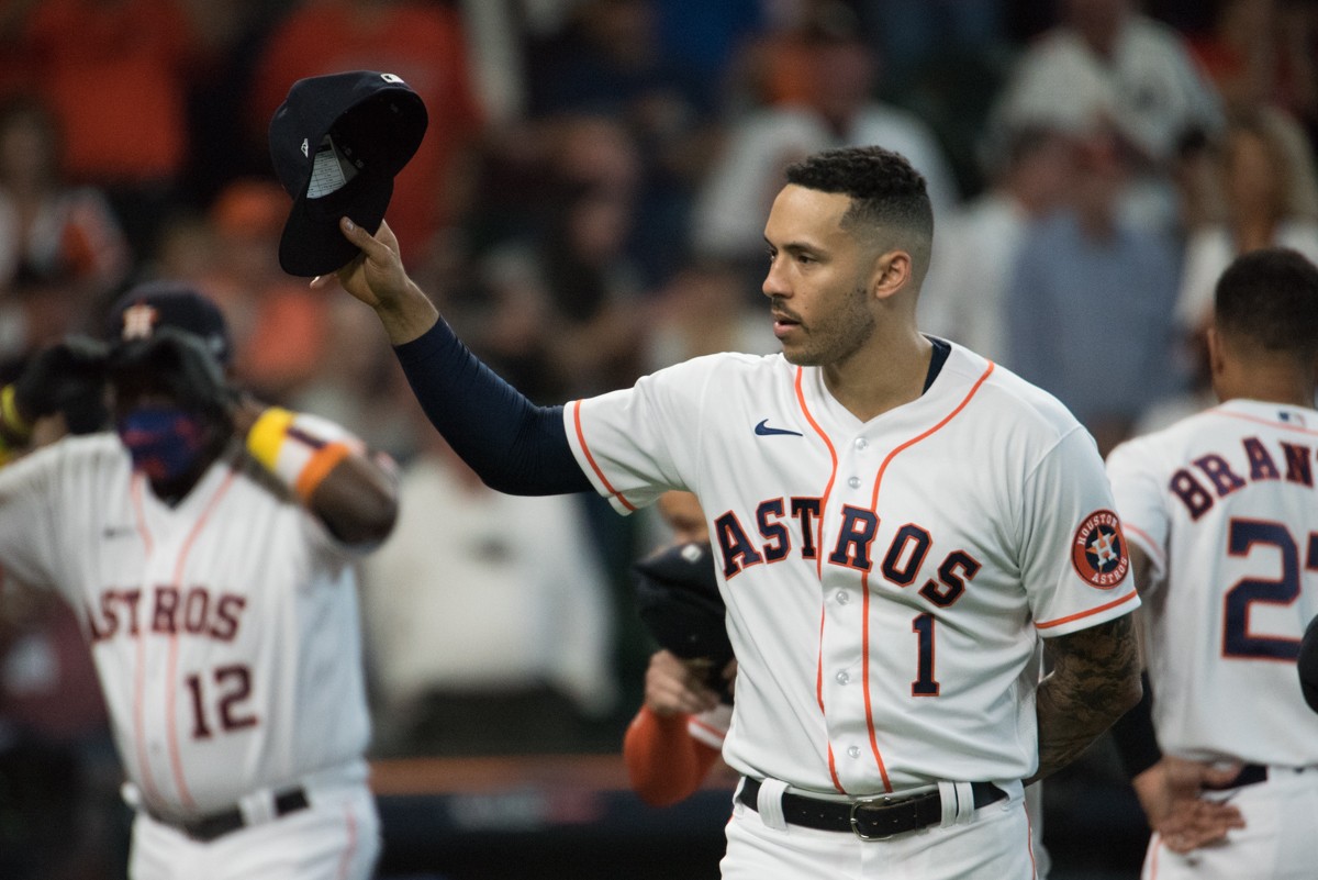 Carlos Correa tipped his hat to fans for the last time as an Astro.