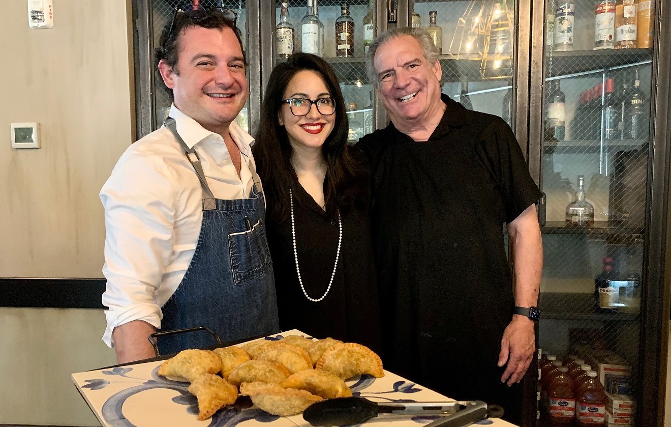 Chef David Cordua poses with The Lymbar's Odilia Conflenti and his father Michael Cordua.
