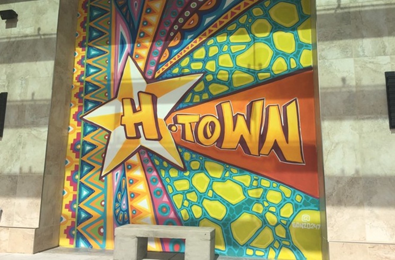 GONZO247's still unnamed "H-Town" mural sits snugly between two downtown hotels.