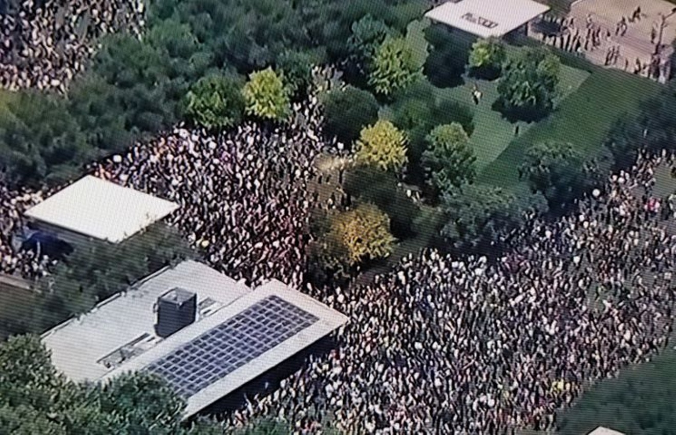 A large crowd has amassed at Discovery Green in honor of George Floyd today./