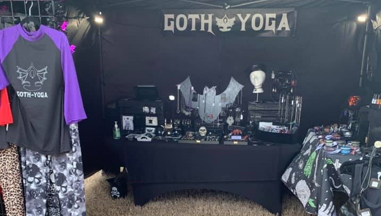 A Goth Yoga booth at market.