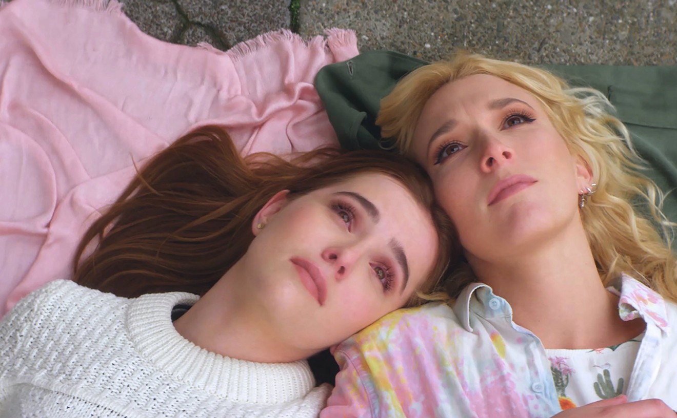 Real-life sisters Madelyn Deutch (right) and Zoey Deutch play Izzy and the younger Sabrina, respectively, in The Year of Spectacular Men, the first film directed by actress Lea Thompson, who is the mother of the two stars.