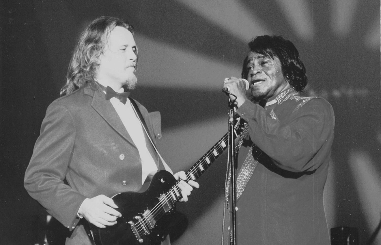 Damon Wood (who James Brown always called "Damien") and the boss onstage.