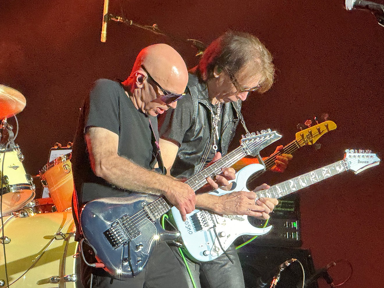 Joe Satriani (left) and Steve Vai shredding.