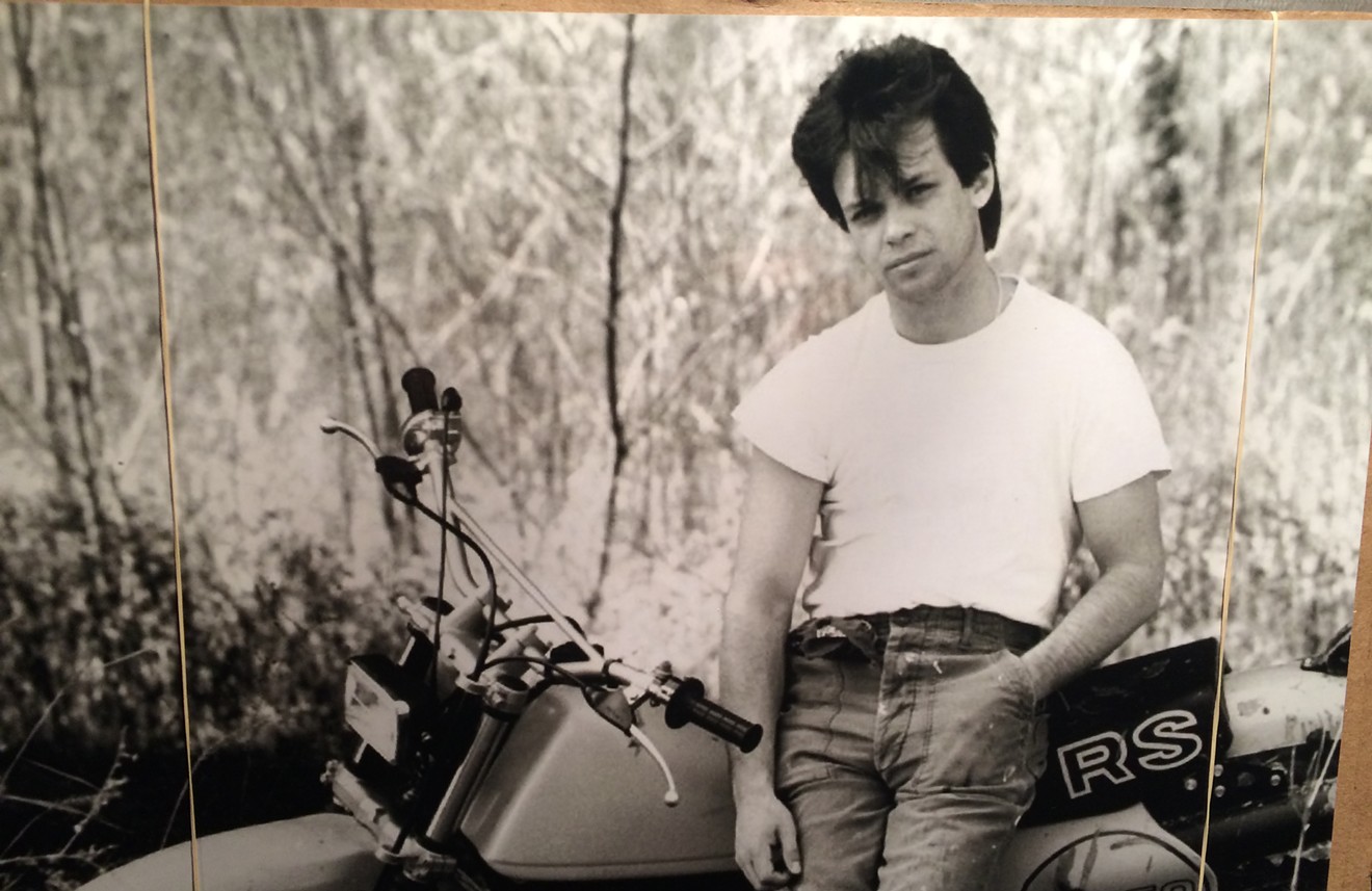 John Mellencamp with one of his ever-present motocycles.