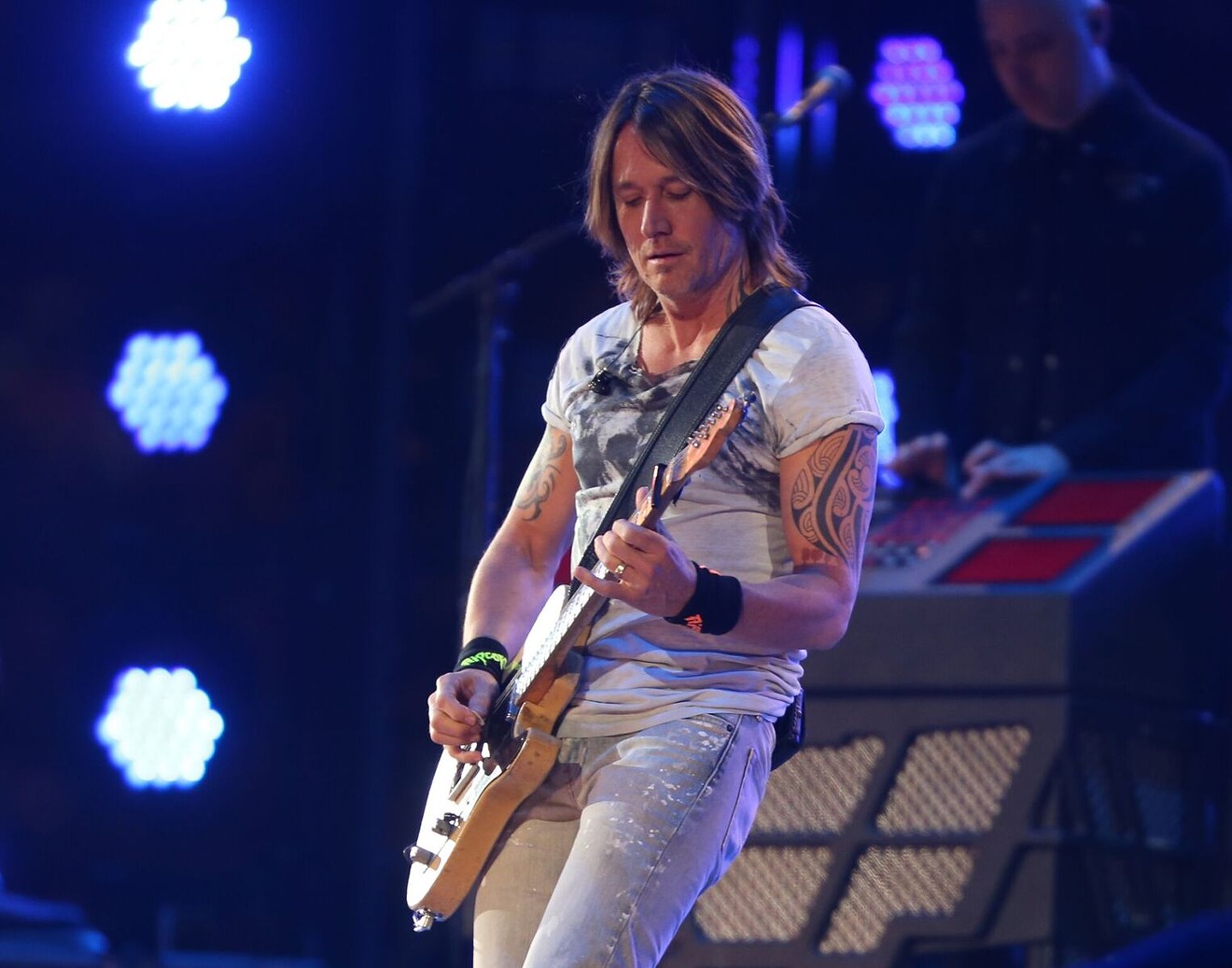 Keith Urban doing what he loves most with his guitar.