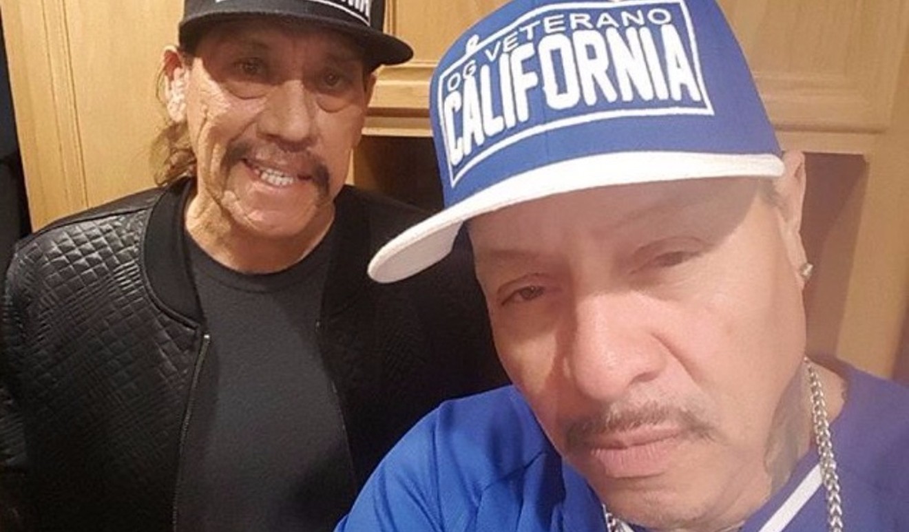 Rapper Frost keeps other legendary Chicanos, such as actor Danny Trejo, left, in his circle.
