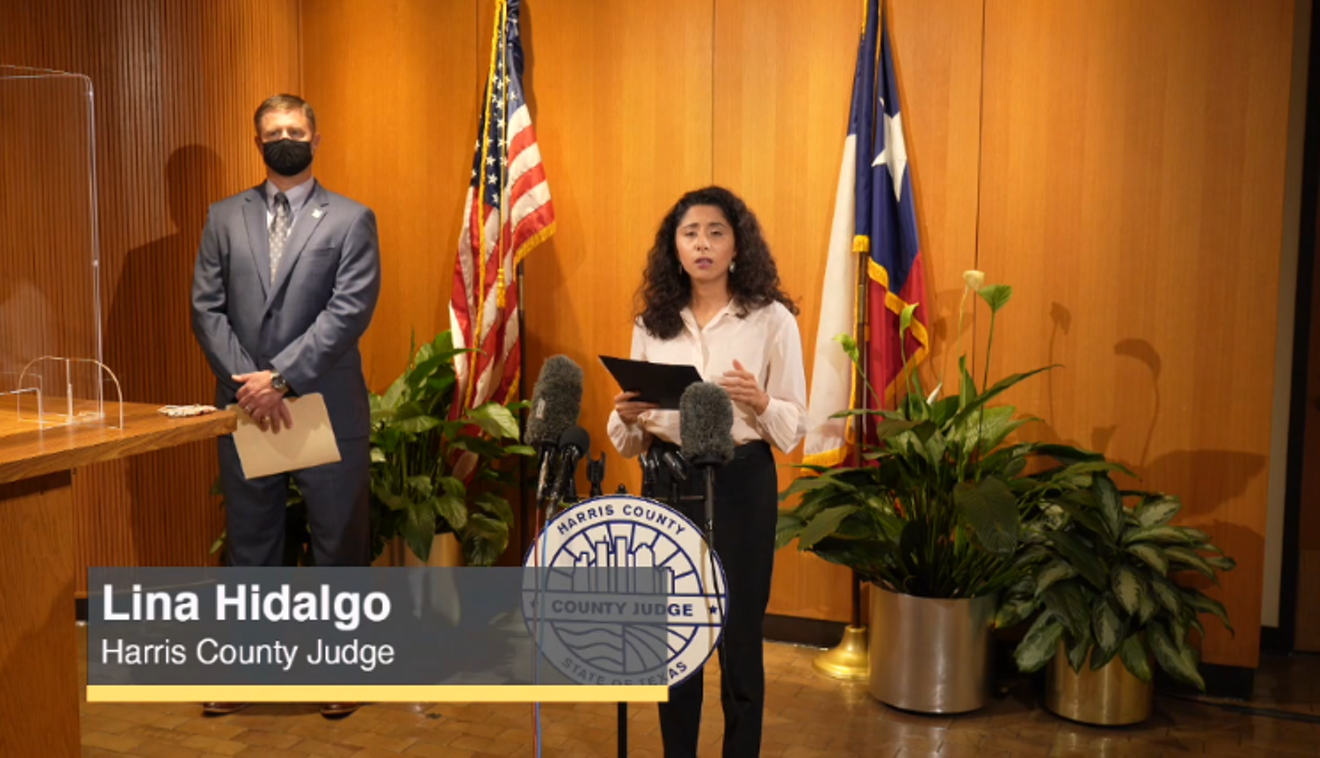 Harris County Judge Lina Hidalgo and Russ Poppe of the Harris County Flood Control District at Friday's press conference.