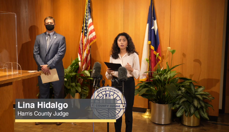 Harris County Judge Lina Hidalgo and Russ Poppe of the Harris County Flood Control District at Friday's press conference.