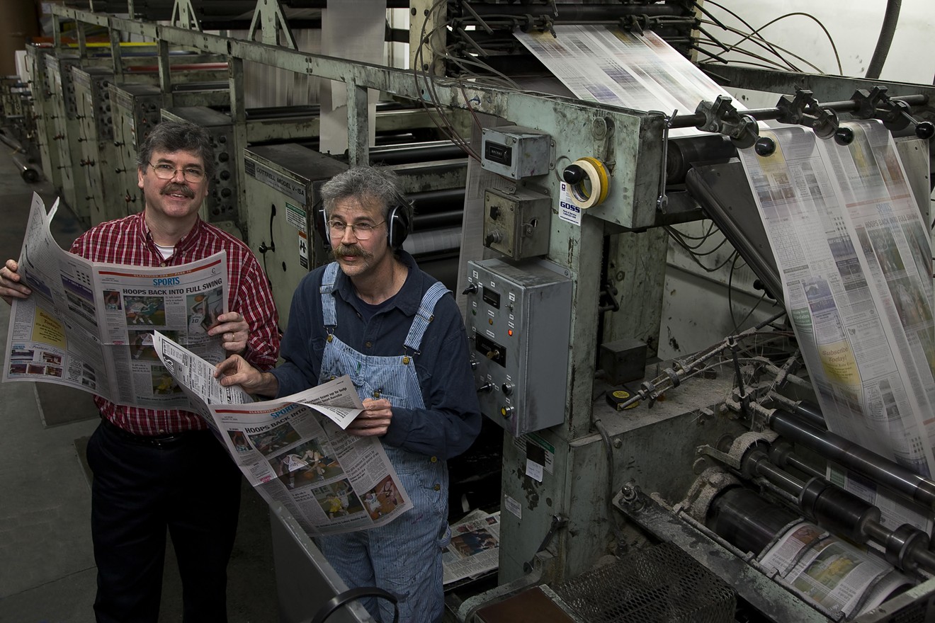 Art Cullen and brother John reviews fresh copies of the Pulitzer Prize winning The Storm Lake Times.