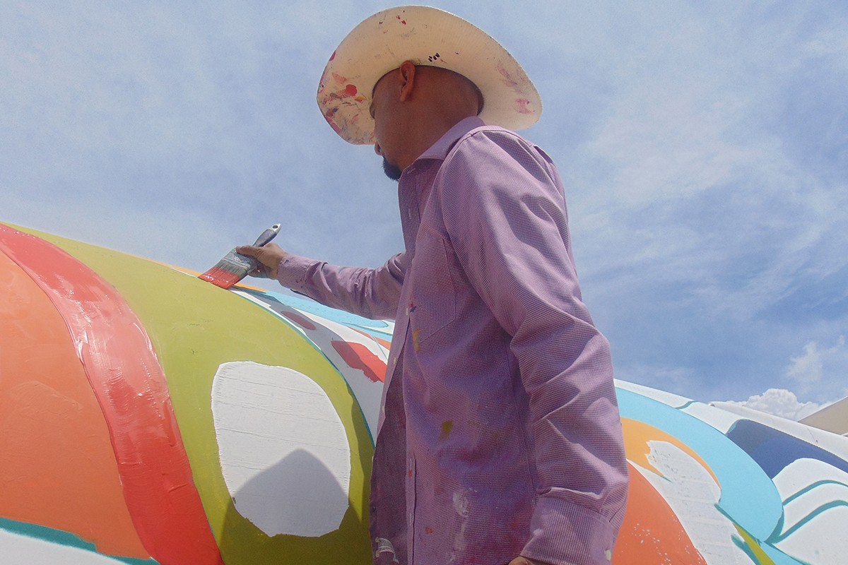 Mario Figueroa Jr., aka GONZO247, has been busy painting a 1969 Hawker jet near the 1940 Air Terminal Museum.