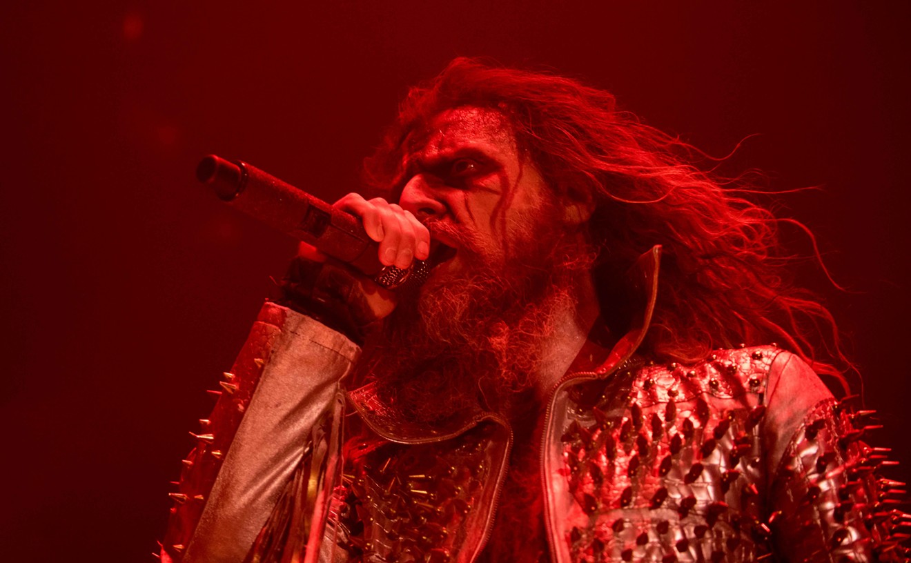 Rob Zombie struts across the stage at the Woodland Pavilion.