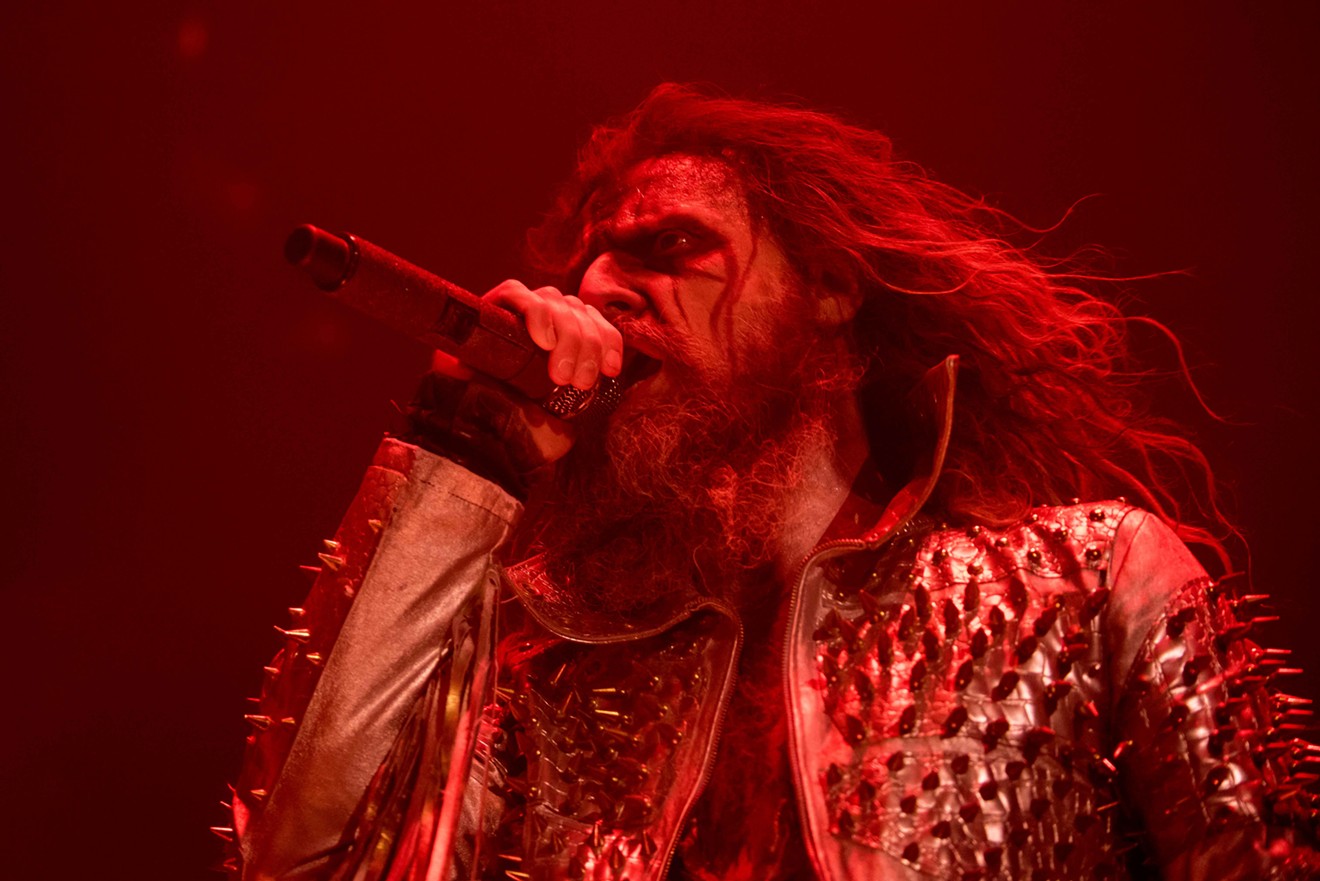 Rob Zombie struts across the stage at the Woodland Pavilion.
