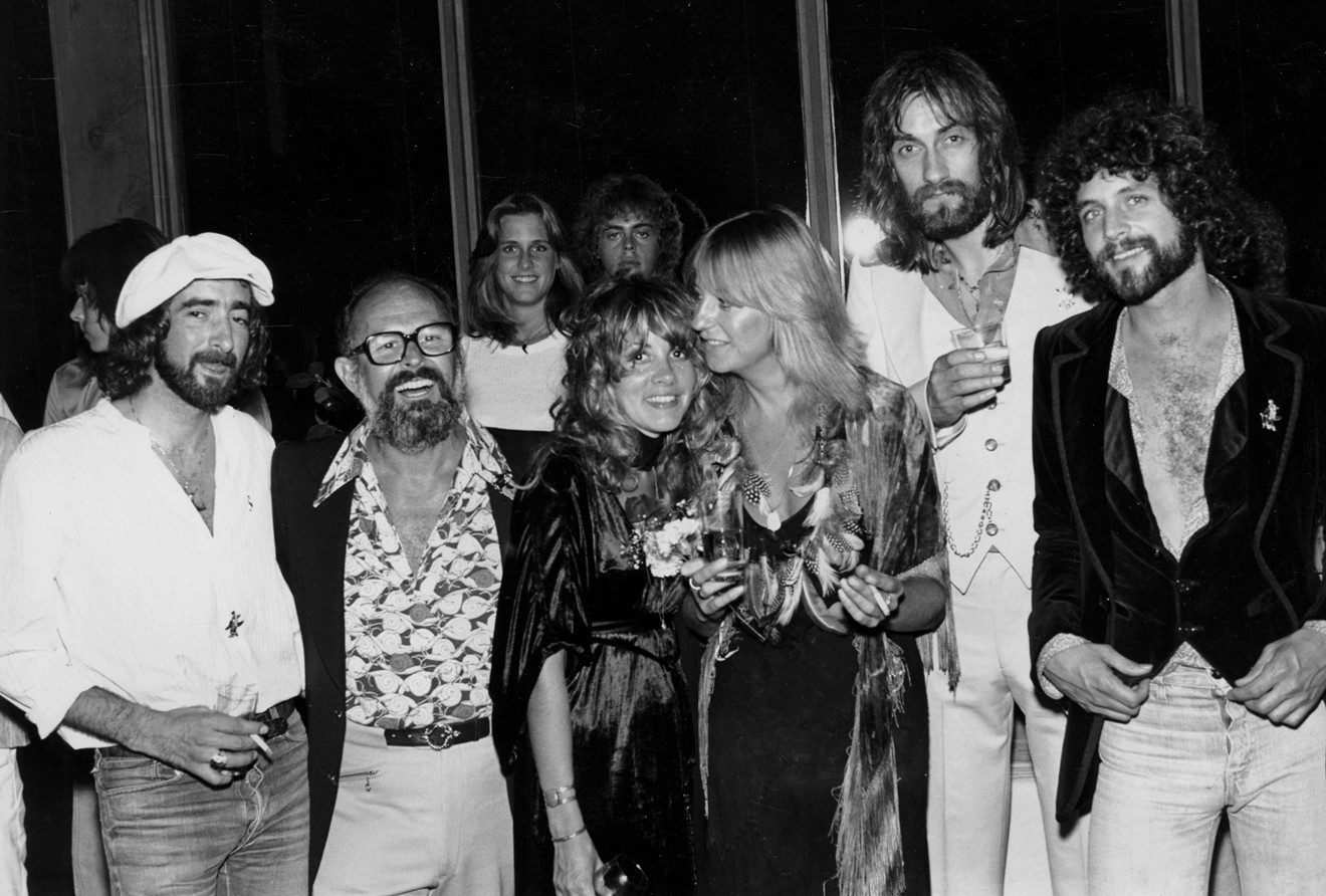 Mo Ostin (second from left) celebrates the mega success of Rumours with Fleetwood Mac (from left: John McVie, Stevie Nicks, Christine McVie, Mick Fleetwood, and Lindsey Buckingham).