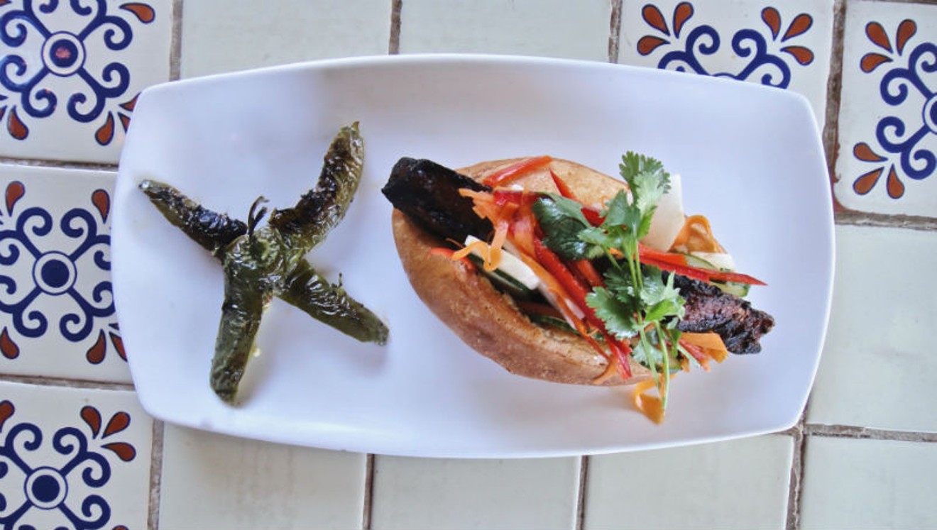 Ninfa’s smoked pork belly torta is a seamless fusion with the bahn mi, and “ven a mí” (come to me), is what Chef Alex Padilla calls it.