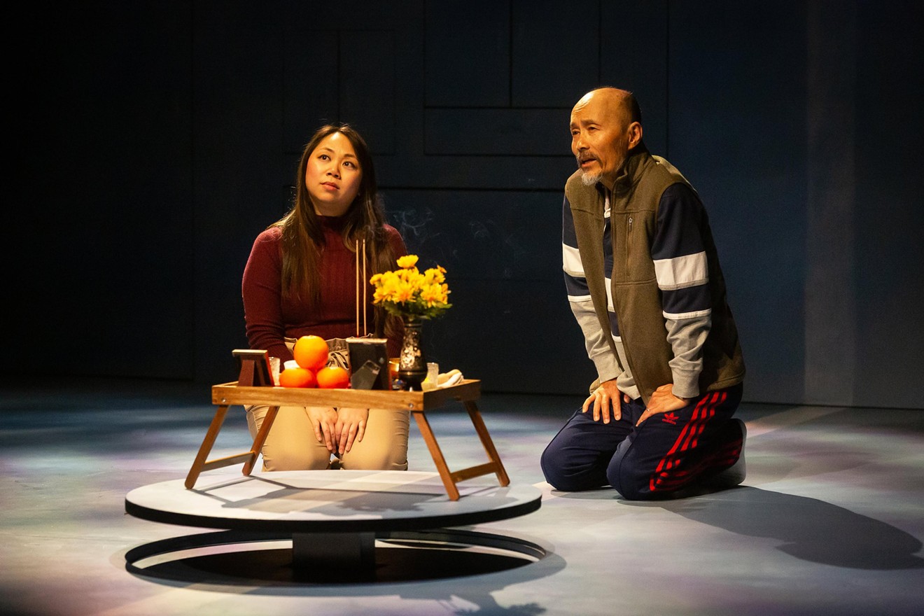 Mai Le as Linh and Long Nguyen as Dau in Alley Theatre’s production of The World Is Not Silent.