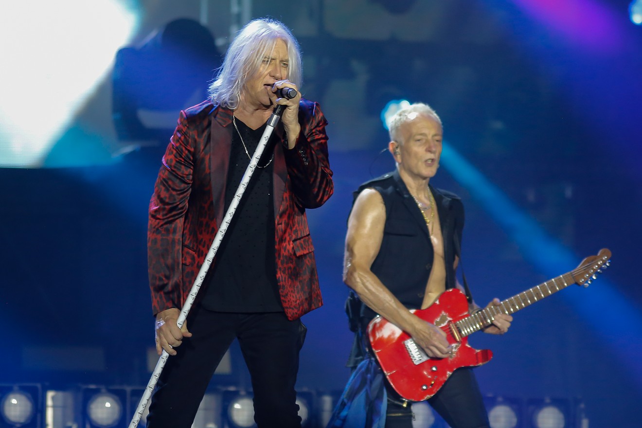 Joe Elliott and Phil Collen of Def Leppard performing at Minute Maid Park on The Summer Stadium Tour.