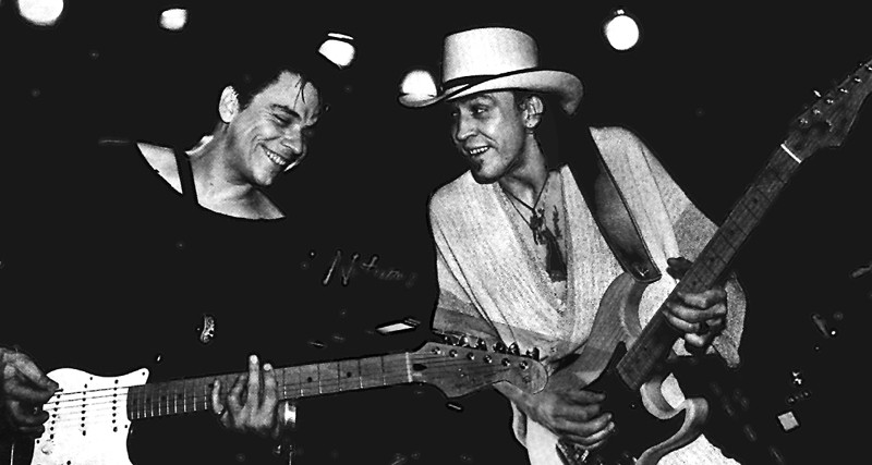 Jimmie and Stevie Ray Vaughan onstage.