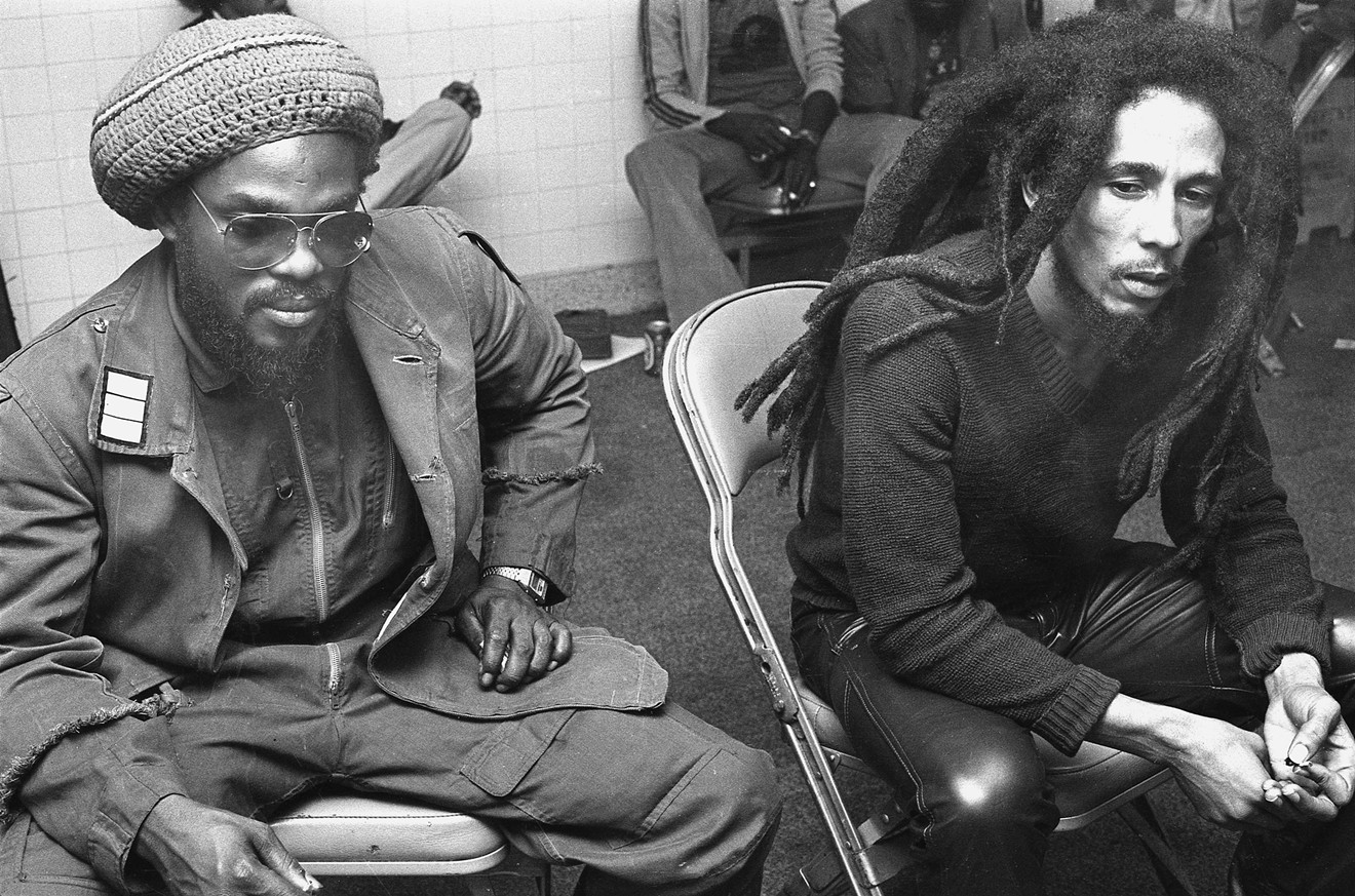 Wailers bassist Aston "Family Man" Barrett and a pensive-looking Bob Marley backstage at the San Diego Sports Arena dressing room, November 24, 1979. Marley is already looking gaunt from his cancer.