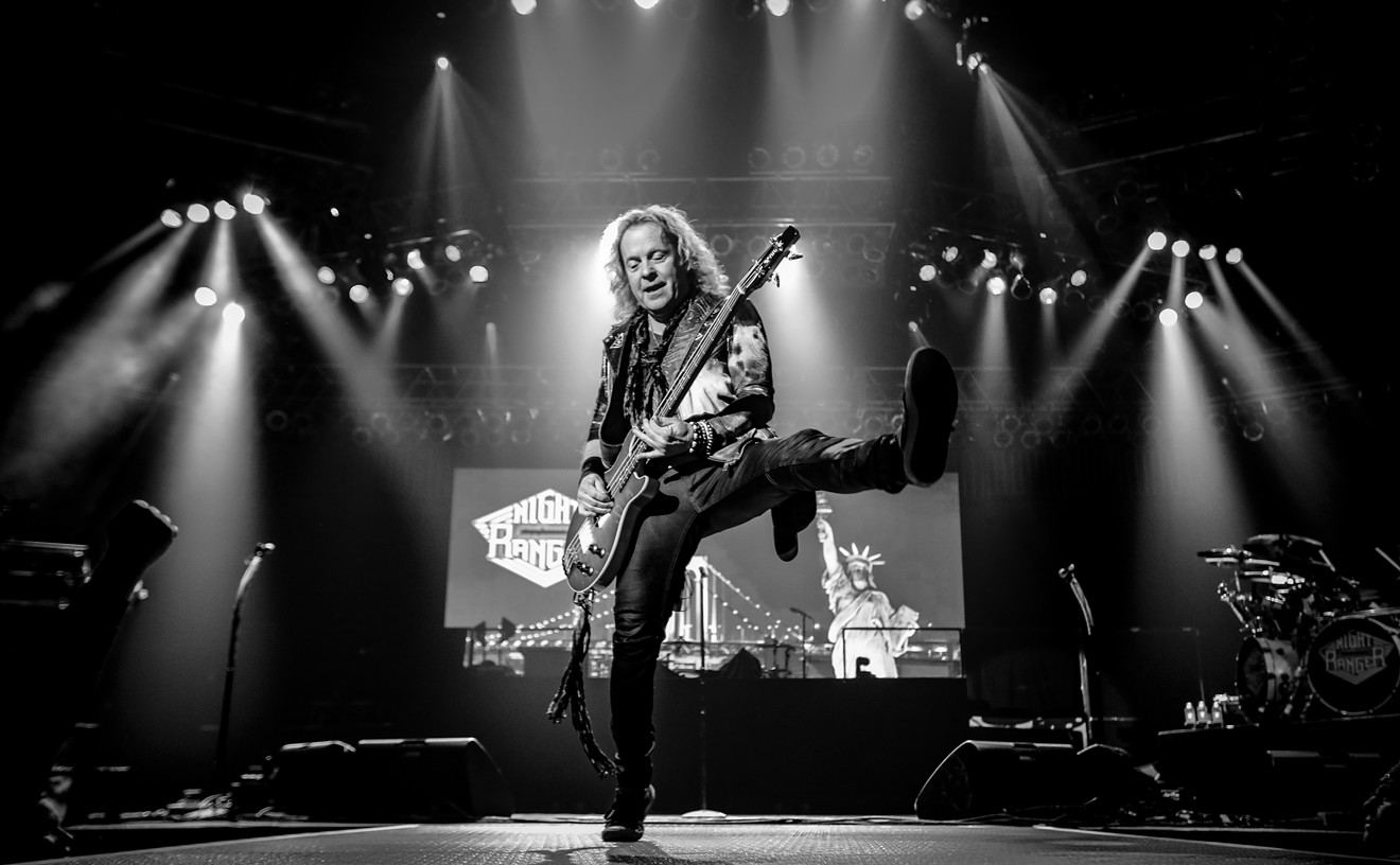 Jack Blades onstage with Night Ranger