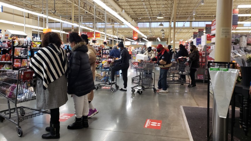 An H-E-B in Missouri City had long checkout lines as residents flocked to stock-up for the next few days.