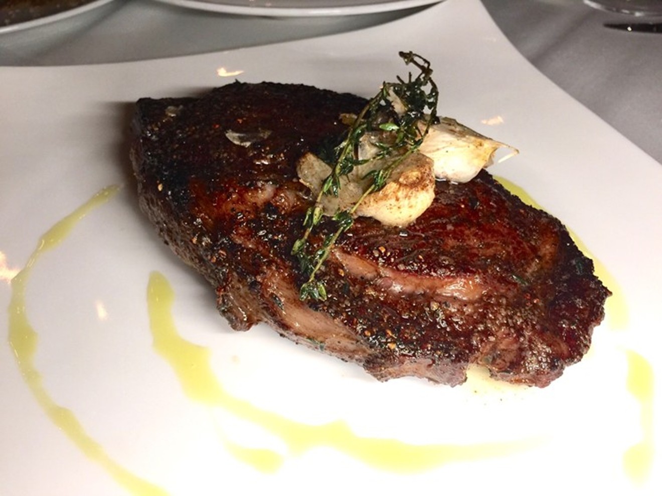 One-Fifth's wet-aged 16 ounce rib-eye steak.