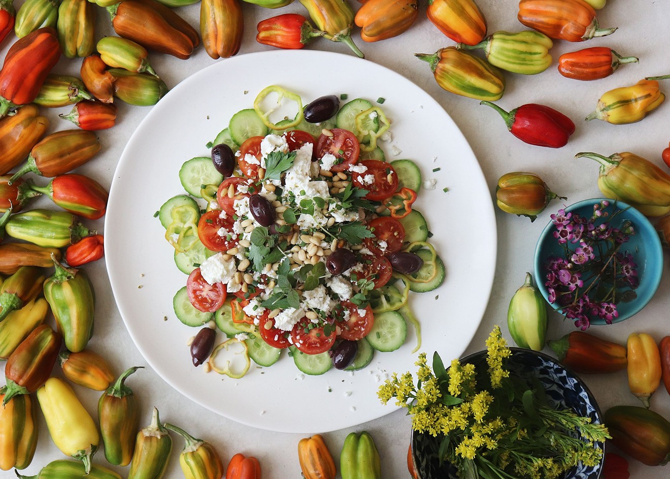 A traditional Greek salad is loaded with healthy and delicious ingredients.