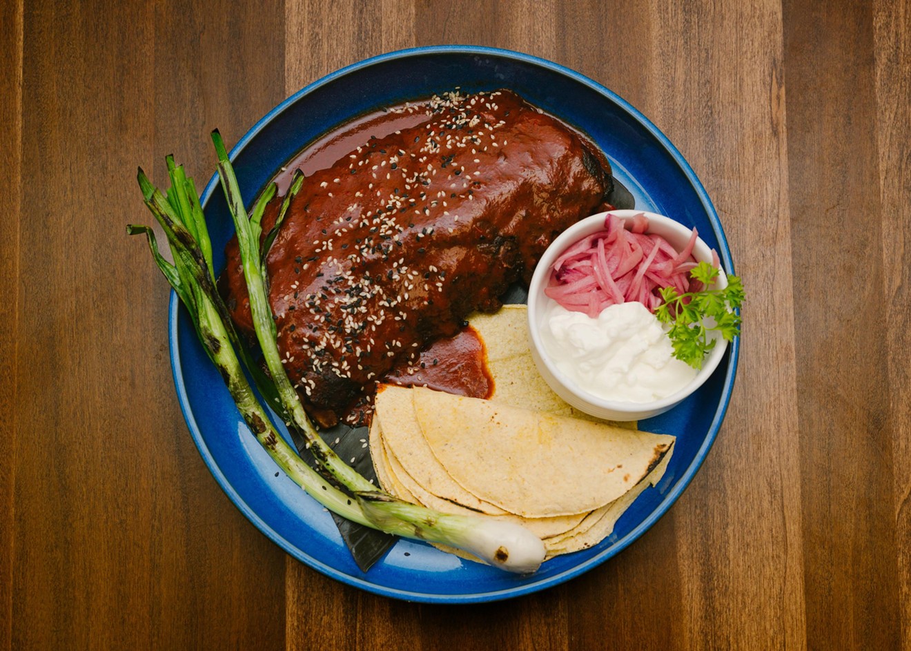 The Achiote Braised Ribs is a Latin twist on Texas barbecue.