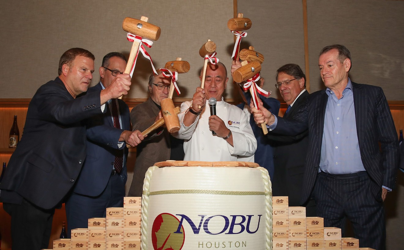 Nobu Founders Robert De Niro, Chef Nobu Matsuhisa, Meir Teper, and friends break open a 5-gallon sake barrel at the Nobu Houston Sake Ceremony.
